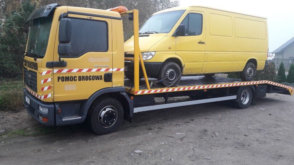 Pomoc drogowa, przewóz transport maszyn, ciągników, Laweta
