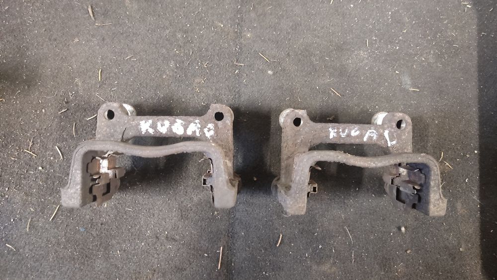 Jarzmo hamulca tylnego tył prawe lewe Ford Kuga mk1 2.0 TDCi