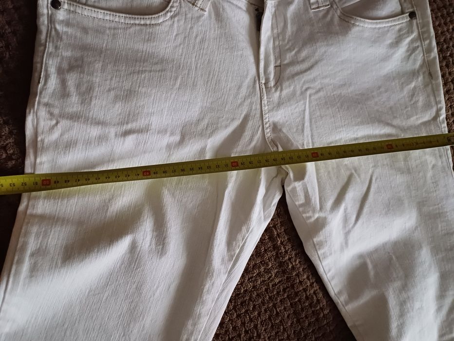 Nowe białe spodnie damskie jeansy 42/ 44