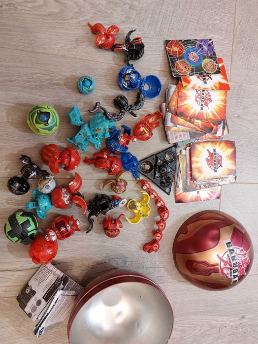 Wielki zestaw Bakugan 24 szt. dużo kart– figurki, karty, akcesoria + puszka kolekcjonerska