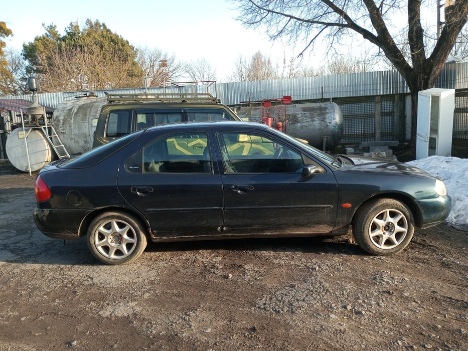 ford Mondeo 1.8 benzun на титанах