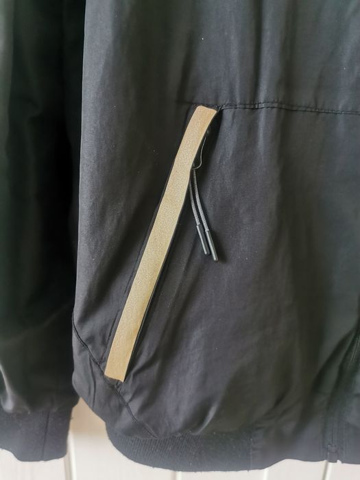 Kurtka przeciwdeszczowa przejściowa z kapturem