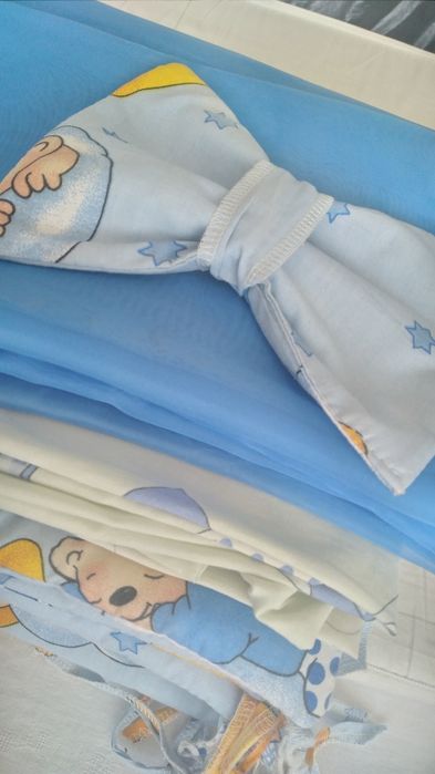 Бортики,  балдахін,  простирадло на резинці в дитяче ліжко