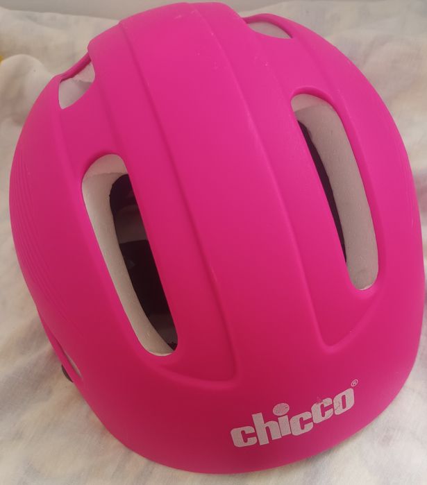 Capacete cor de rosa da Chicco,tamanho 48/54 cm.