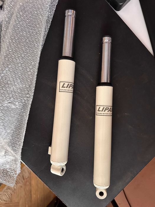 Амортизатор передній (перья)