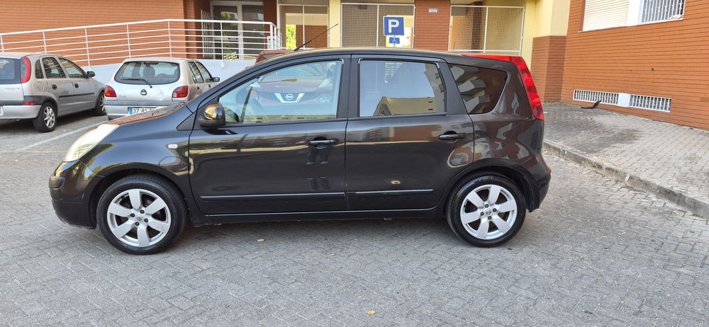 Nissan note 1.4 gasolina impecável 11