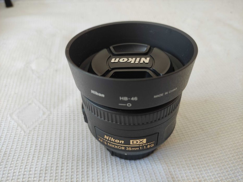 Câmera Nikon 5100 + lente 35mm + bateria adicional pouco uso