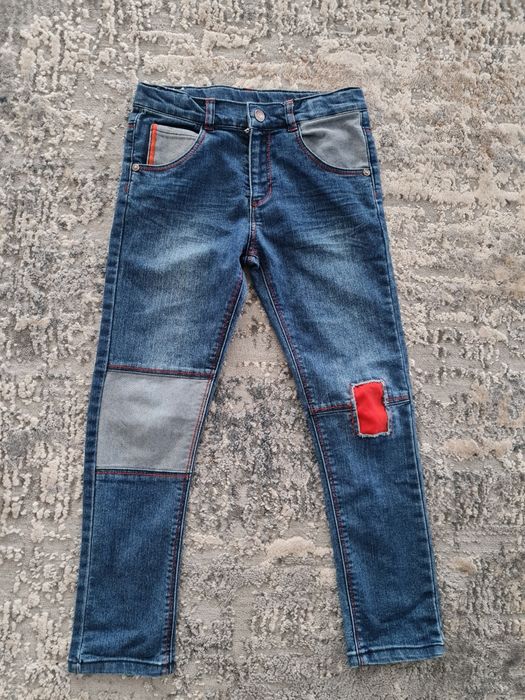 Niebieskie spodnie chłopięce slim fit Boboli