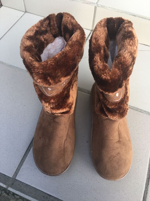 Жіночі зимові валяночки.