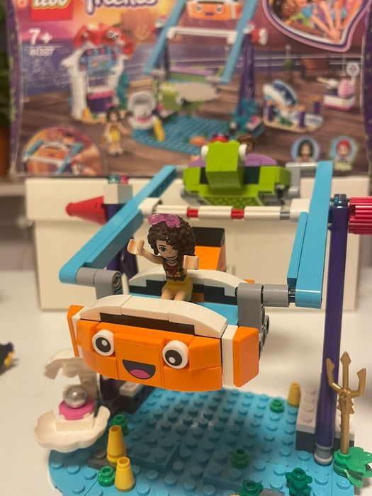 LEGO Friends 41689 Magiczny diabelski młyn i kramik z biletami