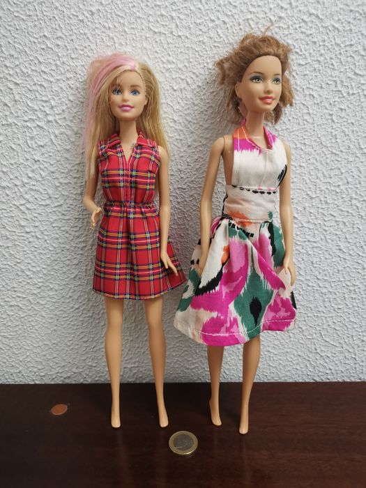 2 Original Barbie Dolls + 5 Non-Original Barbie Dolls