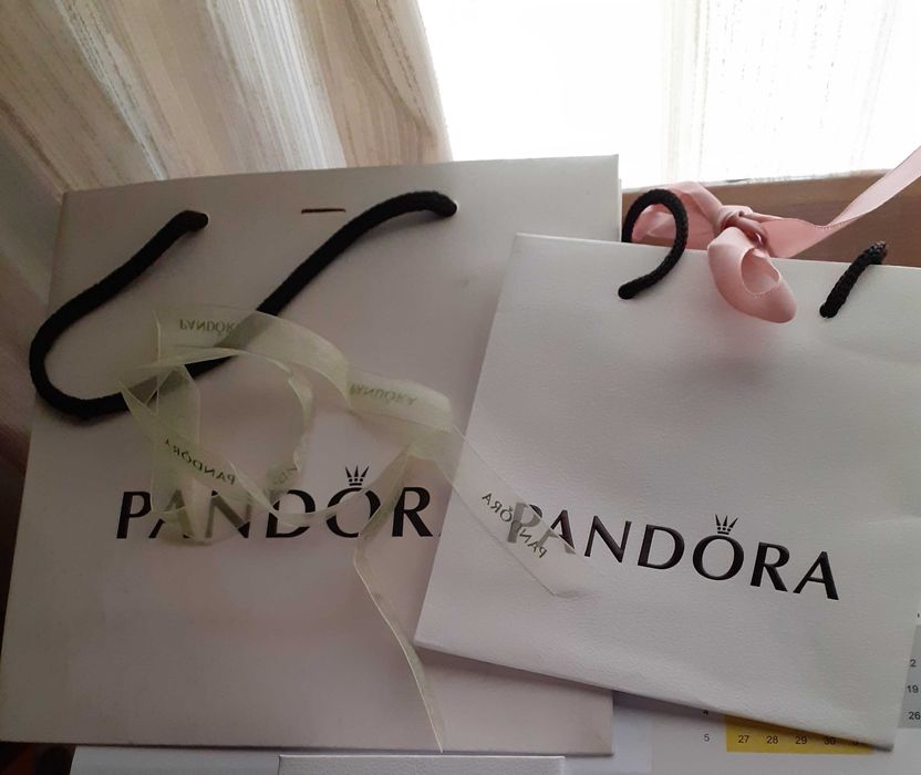 Catões Tous e sacos pandora - novos