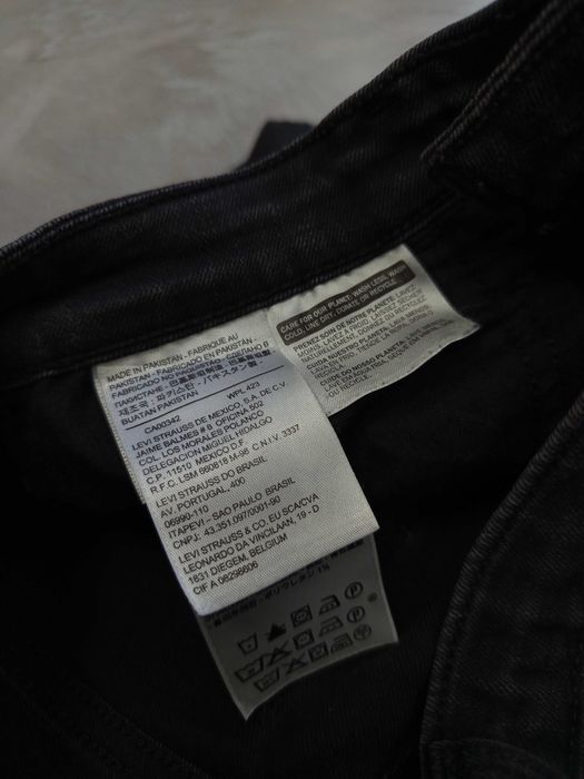 Damskie spodnie Levis W25 L30 XS
