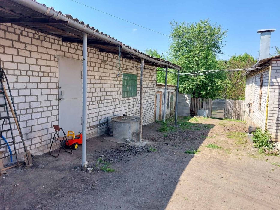 Люботин!Продам часть дома.Центр.