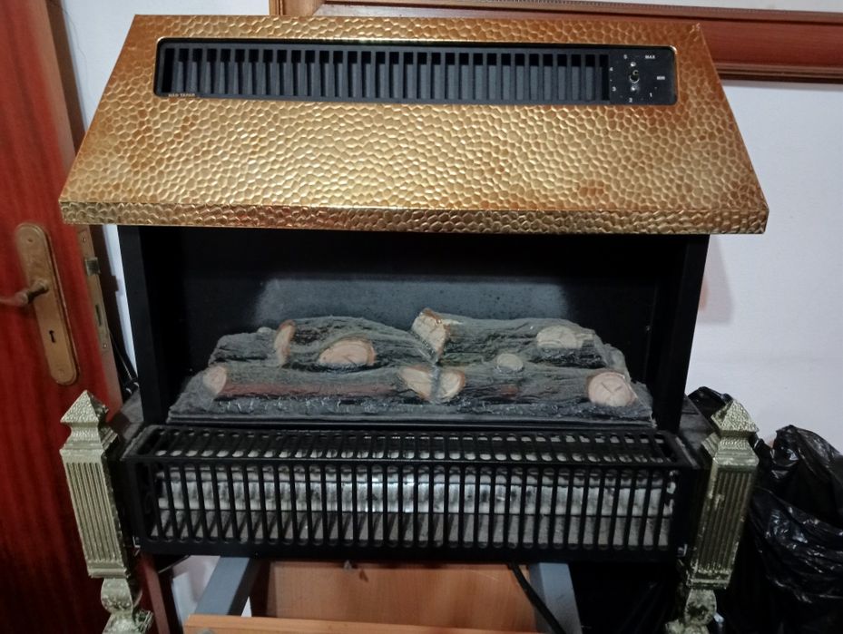 Vendo aquecedor antigo a funciinar muito bem