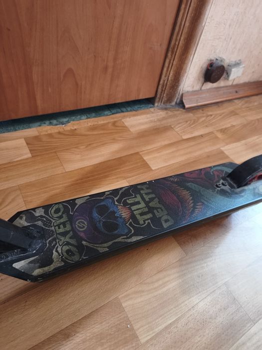 Трюковий самокат Oxelo Scooters MF 1.8 у хорошому стані
