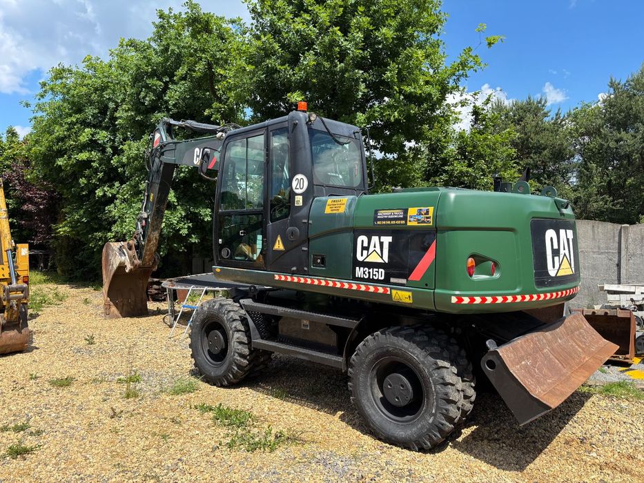 Caterpillar M315D rok 2013r 14mtg ZEPPELIN GERMANY  Koparka kołowa CAT M315D rok 2013 z Niemiec 14.7mtg chwytak, łyzka