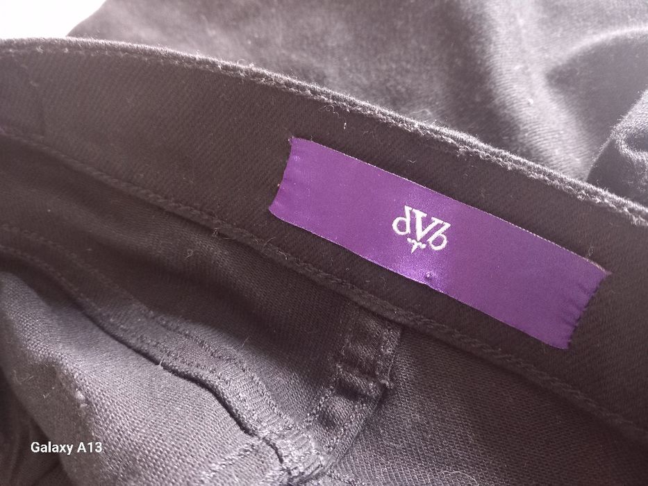 Victoria Beckham oryginalne spodnie dzwony 27 S