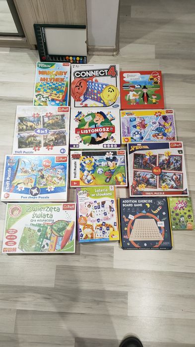 Puzzle Trefl i gry planszowe 13 sztuk.
