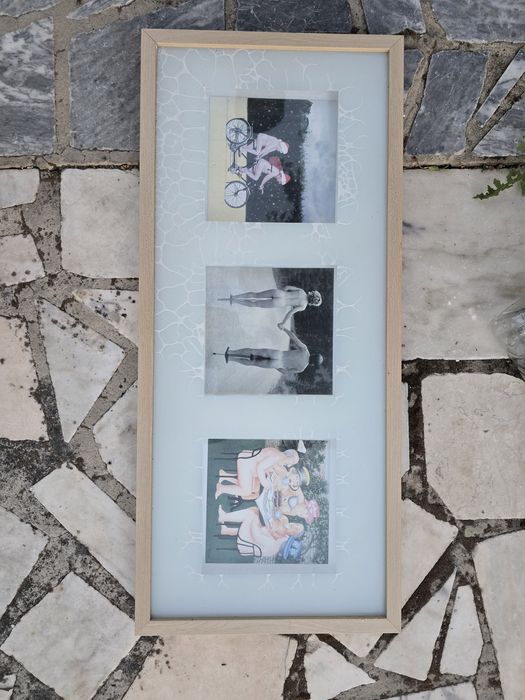 decorative multi-aperture collage frame containing three art prints