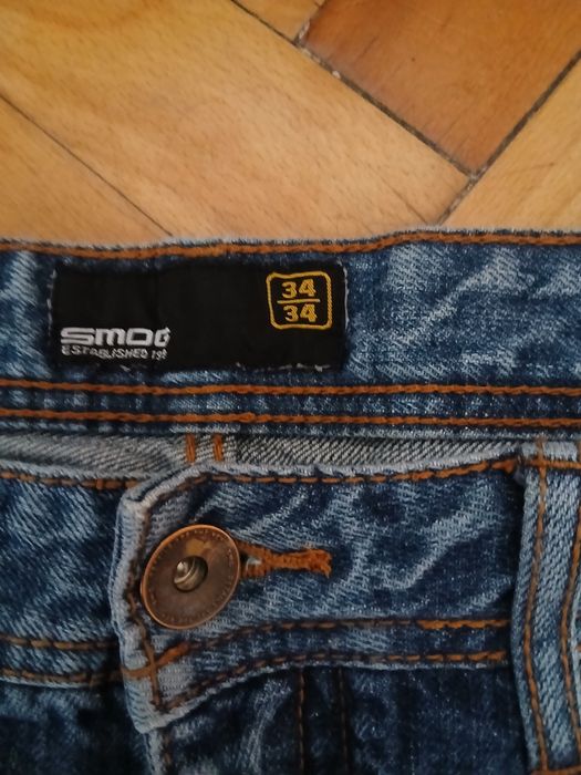 Spodnie jeans męskie z przetarciami  New Yorker  34