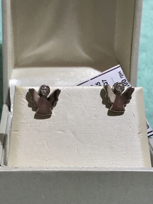 Очень оригинальные золотые серьги в белом золоте на закрутках!