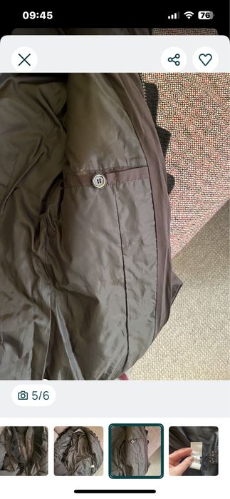 Пуховик чорного кольору