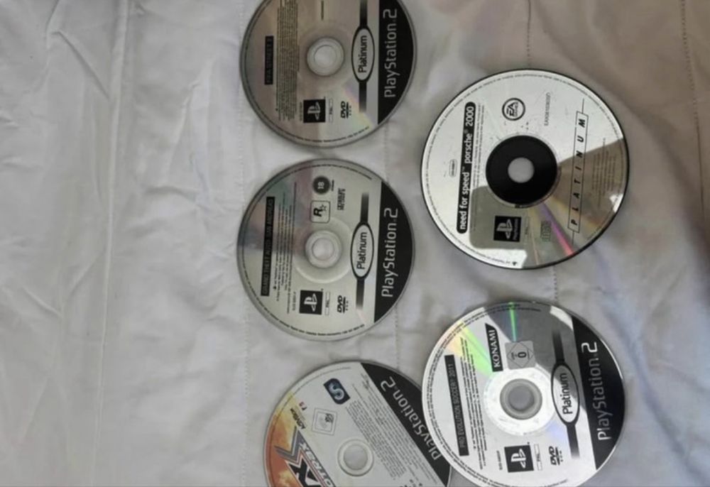 Playstaion 2 com jogos e 2 comandos