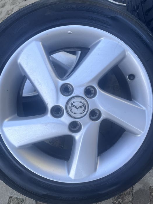 Komplet kół Mazda R16 – 2x Hankook + 2x Continental 205/55R16
