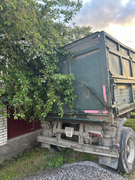 Камаз самоскид з причепом.