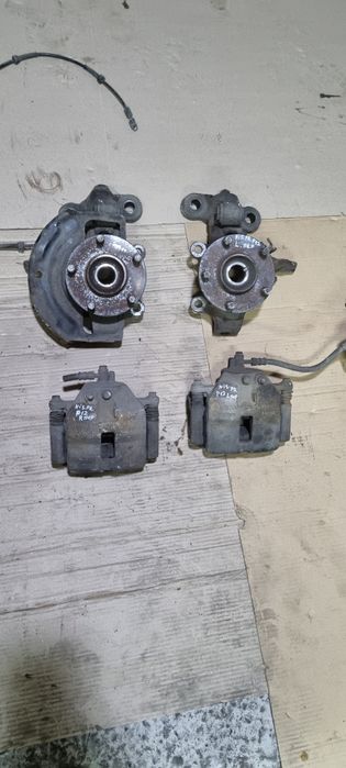 Суппорт тормозной Nisssn primera p12 левый правый супорт примера перед