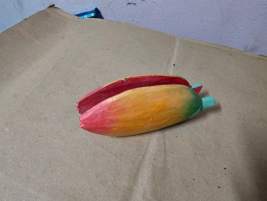Porta guardanapos em forma de manga