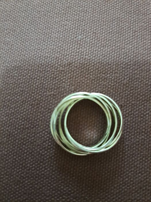 Anel com 7 alianças em prata