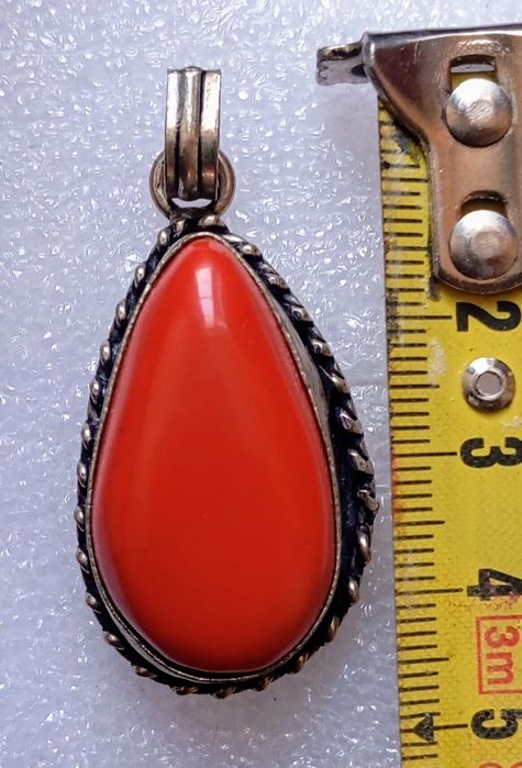 Pingente de Coral vermelho.