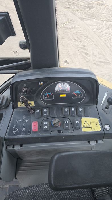CAT 432F z system automatycznej niwelacji Leveller Salon PL
