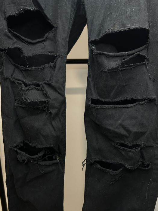 Calças de ganga rasgadas