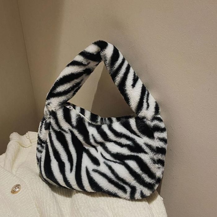 пухнаста сумка зебра та леопард