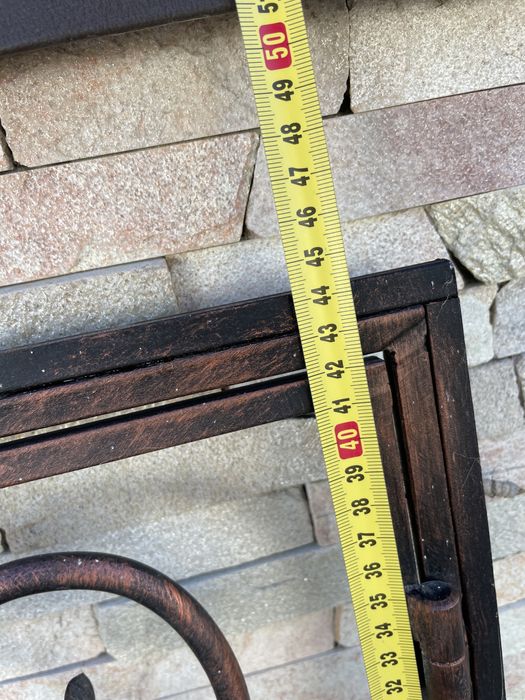 Кована камінна решітка