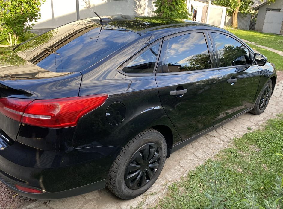 Ford Focus 2015 VIN 1FADP3E20FL265460 фото оголошення 3 з 23