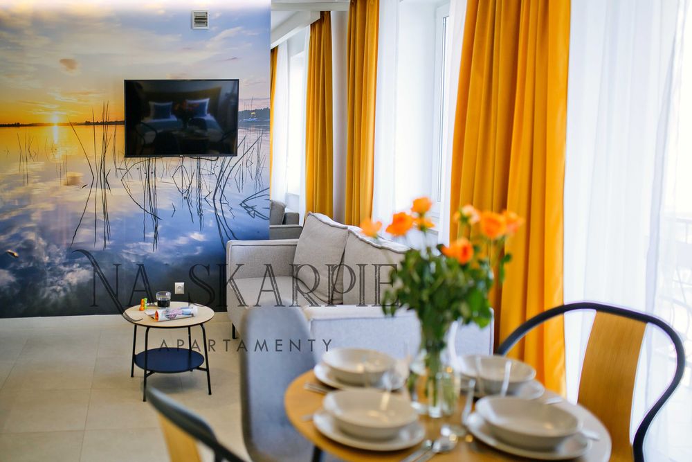 Apartament Na Skarpie 1 - noclegi nad jeziorem, promenada, Mazury