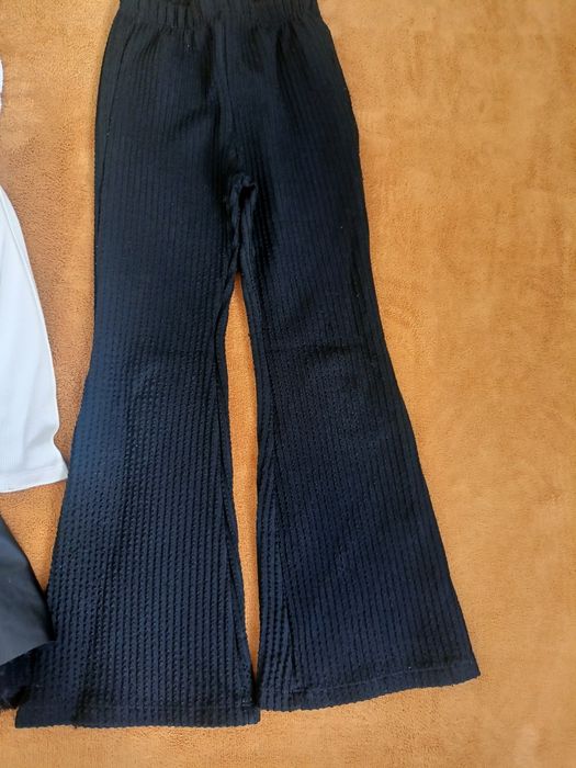 casacos, botas e roupa de criança
