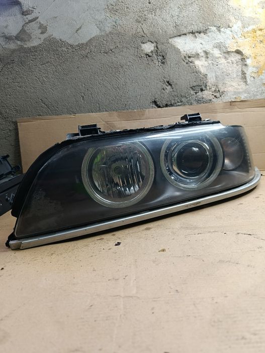 BMW E39 lift 03r-reflektor lewy Hella Europa Xenon