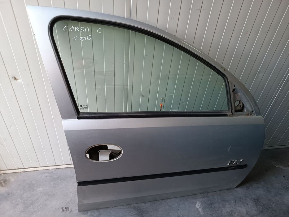 PORTA OPEL CORSA C 01-06 - FRENTE DIREITO / TRAS ESQUERDO