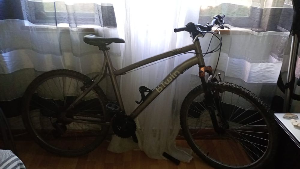 Bicicleta BTWIN  (adulto)