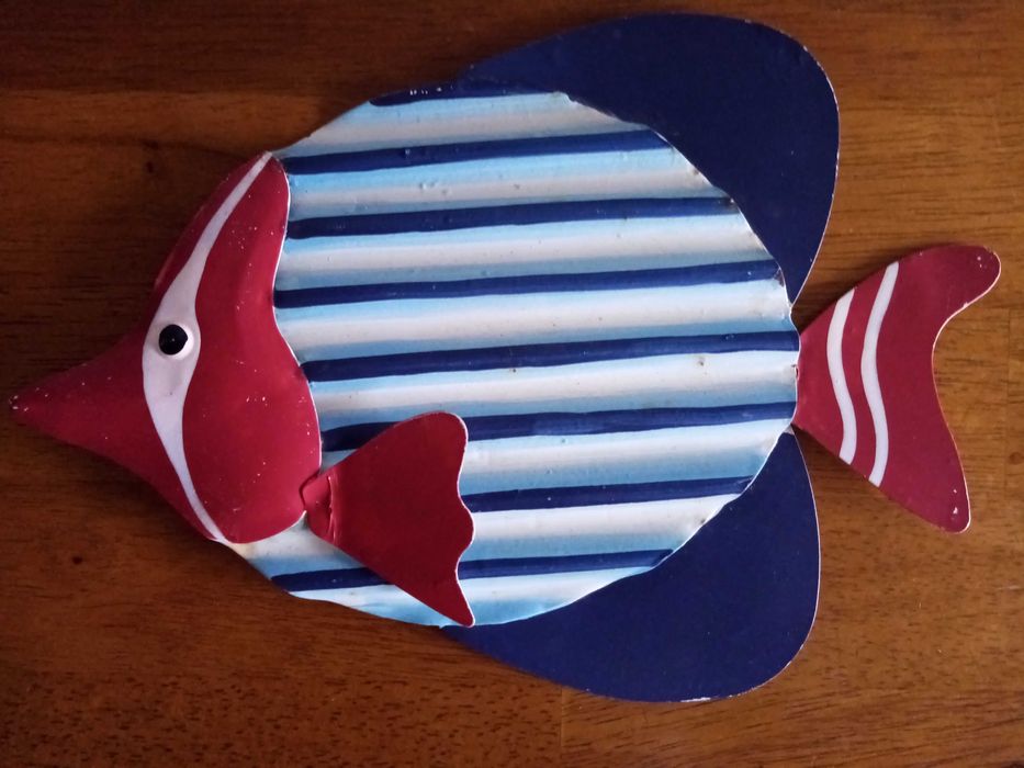 Peça decorativa em metal para pendurar