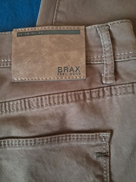 Jeansy męskie materiałowe(brąz oliwkowy)- Brax r.34/32
