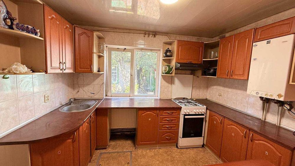 Продаж 3/4 житлового будинку по вул. С.Петлюри (Василини)  район Казбет в м. Черкаси.