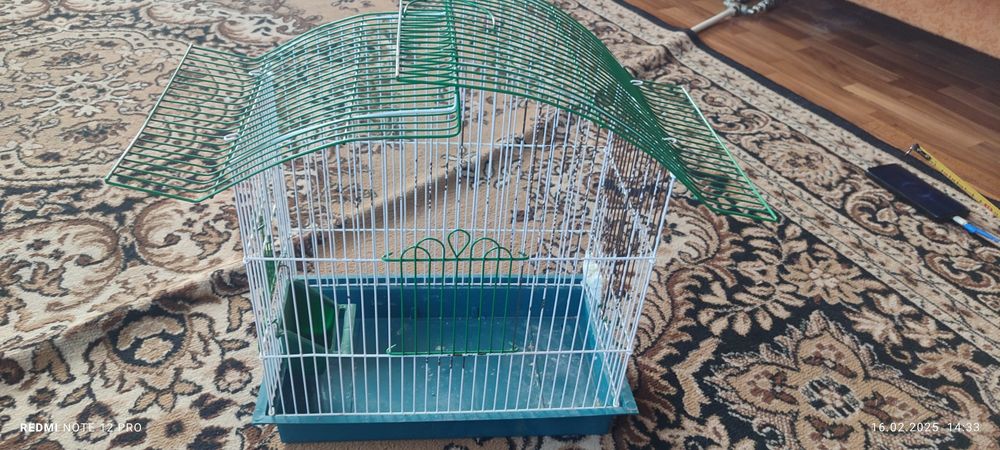 Клітка для попугайв
