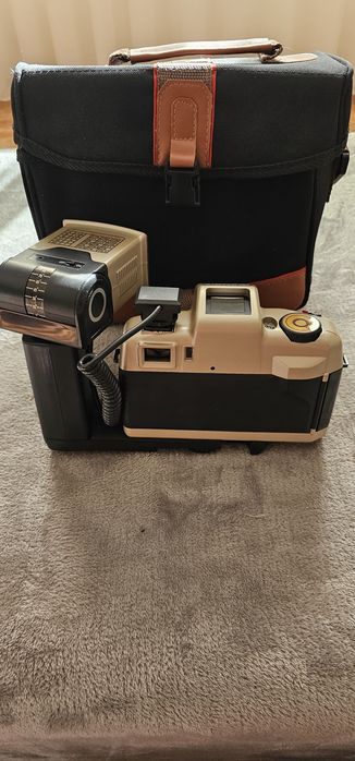 Vendo máquina fotográfica olympia antiga