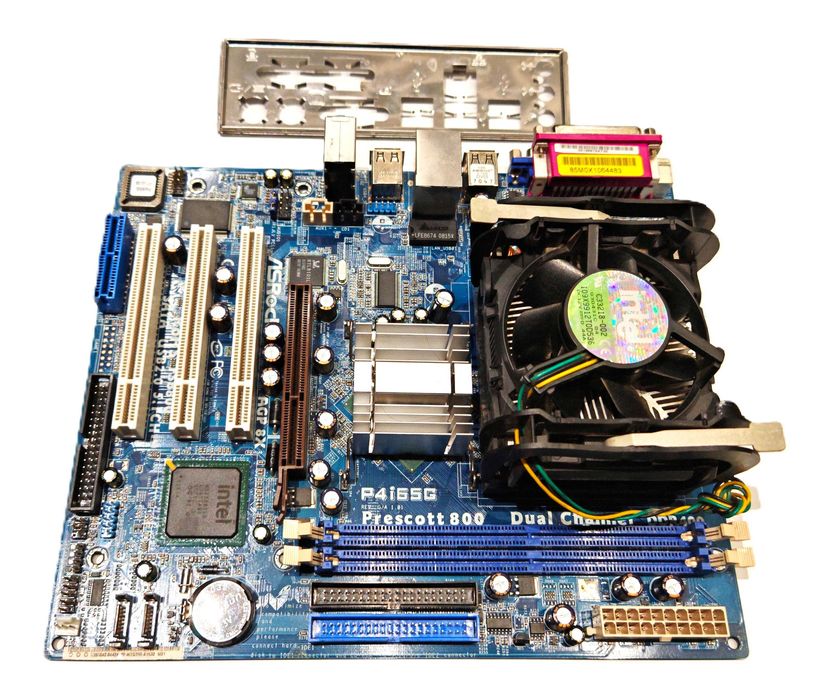 Zestaw Płyta główna ASRock P4i65G SATA + Maskownica portów + Procesor Intel P4 2,4 GHz + RAM 768 MB AM1 AGP x8 PCI IDE LPT COM